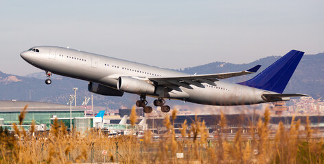 Take off passenger plane in the sky. Airport Barcelona
