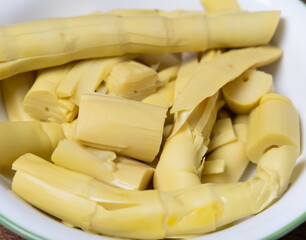 Fresh bamboo shoots in a bowl. Selective focus.