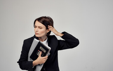 finance model woman in black jacket with documents in hands