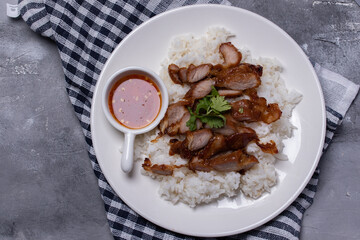 Steamed rice, grilled pork neck with spicy sauce