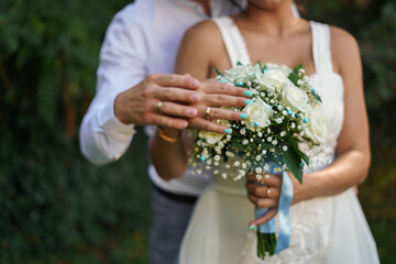 Fototapeta premium bouquet in the hands of the bride