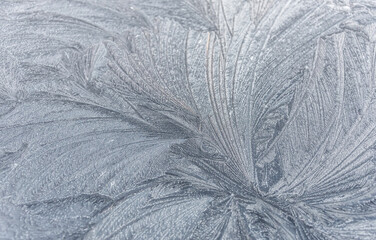 Patterns of Ice on a Frozen Window on a Winter Day