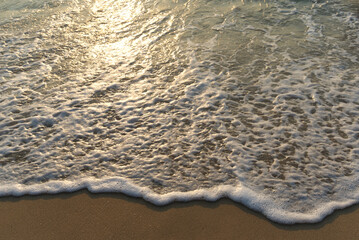 waves on the beach at sunrise Cha-am Phetchaburi near Bangkok, Thailand