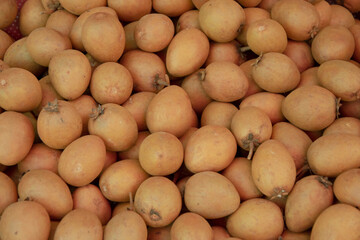 Fresh sapodilla fruit in the market.