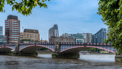 Fototapeta na wymiar View of Lambeth bridge and city buildings along the River Thames in London