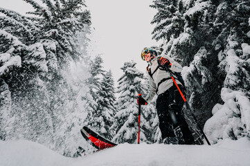 Mountaineer backcountry ski waling two ski alpinist in the mountains. Ski touring in alpine...