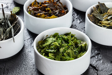 Sea vegetables, edible algae variety on a black background