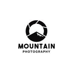 silhouette mountain photography with circle shutter, modern logo design