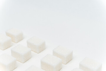 sugar cubes glucose ingredient calories energy light background