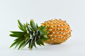Fresh pineapple over white background. Tropical fruit.