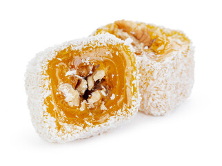 Yellow Turkish Delight with nuts in powdered sugar isolated on white