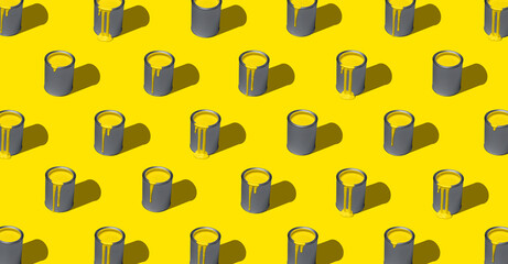 Yellow paint in tin can, pattern, isolated on yellow background. Paint cans symmetry, full-frame