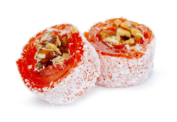 Orange Turkish delight with nuts in powdered sugar isolated on white