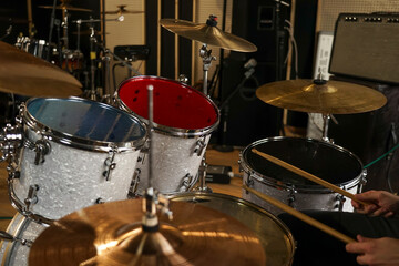 Fototapeta na wymiar Drum set for sound recording. Drums in a metal case on the stand