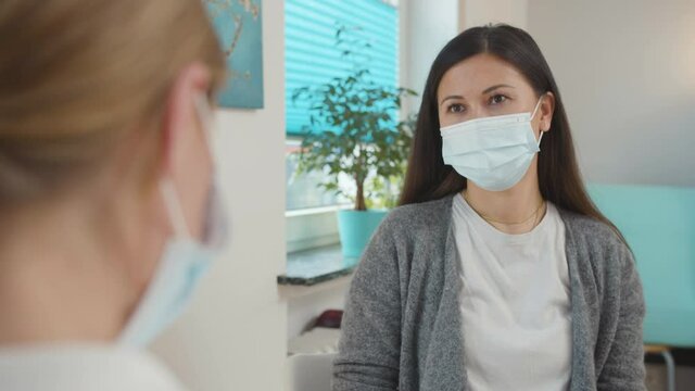 Female therapist discussing with customer