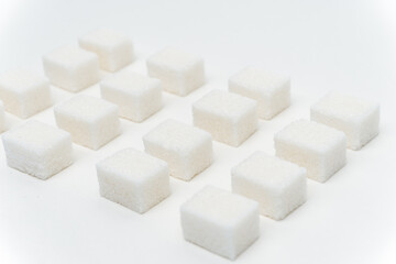 sugar cubes glucose ingredient calories energy light background