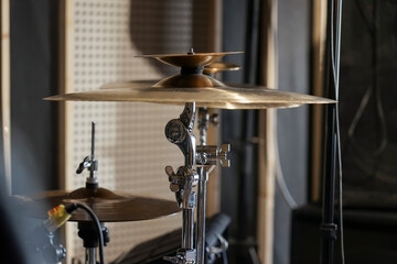 High-hat and crash cymbal close-up in the studio. Drum kit