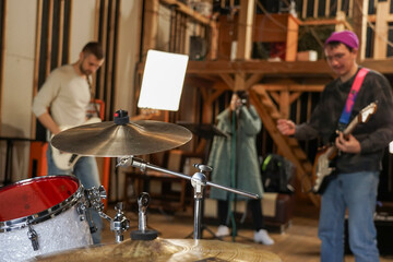 High-hat and crash cymbal close-up in the studio. Drum kit