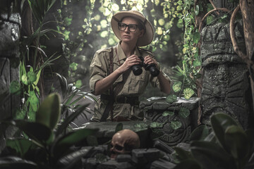 Brave woman exploring the tropical jungle