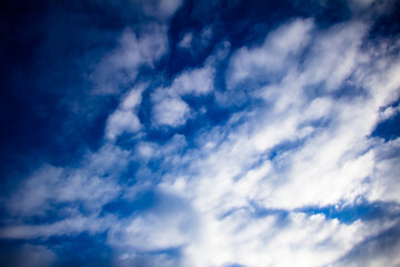 Fototapeta premium Spring March sky with white fluffy clouds Ukraine