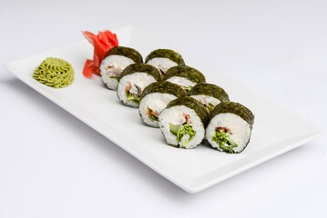 Maki Sushi - Roll made of smoked salmon and cream cheese. Traditional Japanese cuisine concept, over white background.