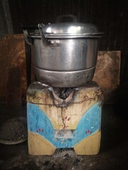 traditional stoves for cooking rice in some rural communities in Indonesia