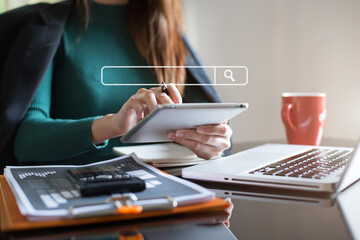 Women are sitting searching for information.