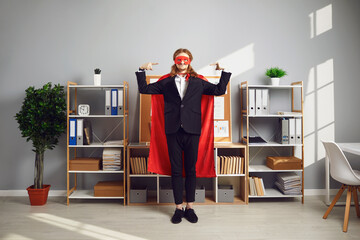 I'm the best. Funny egocentric company leader or office worker in suit, superhero mask and super...