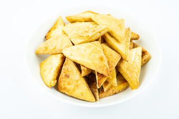 A plate of golden fried dried tofu