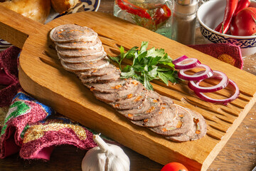 Beef roll with Suluguni cheese, carrots, herbs, coriander and red onion