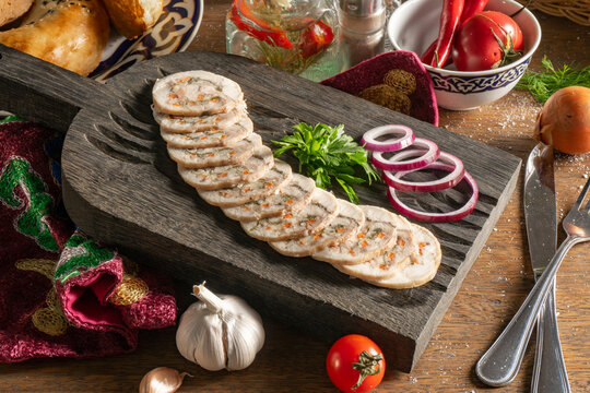 Chicken roll with Suluguni cheese, carrots, herbs, coriander and red onion
