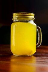 Ginger tea with lemon and mint over black background. Ukrainian cuisine concept, Christmas time.