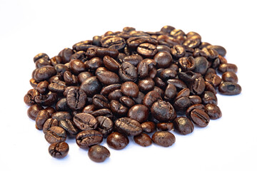 Pile of Coffee bean roaasted close up on white background for beverage,drink,food,cafe concept.