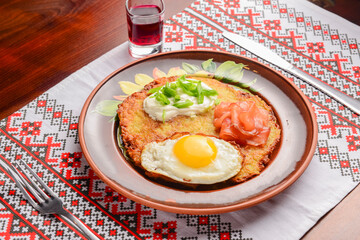 Healthy breakfast fried egg on a plate, healthy food. Ukrainian cuisine concept.