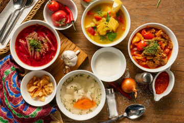A large set of soups, Borscht, lagman, shurpa, chicken broth and fish soup.