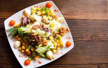 caesar salad on a plate close up