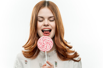 pretty woman licks round lollipop sweets joy emotions