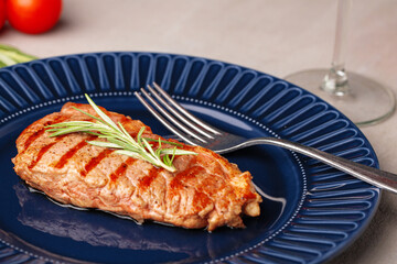 Grilled beef steak served on blue plate