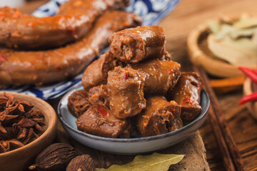 Delicious spiced duck neck on a plate