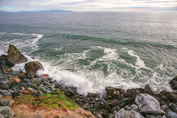 The Pacific Ocean coast in the city of Monterey in California. United States of America. Beautiful beach on a sunny day. Ocean landscape.