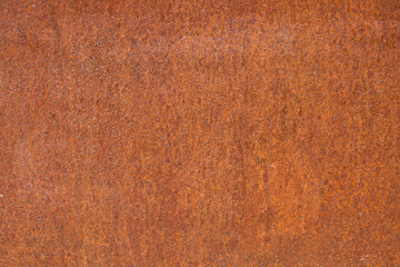 Rusty metal. Terracotta background out of focus