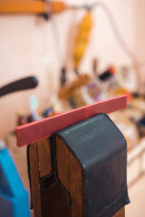 The strip of skin is clamped in the sewing clip