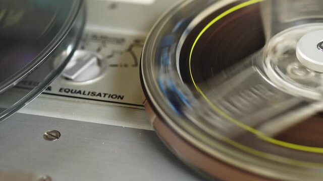 Old vintage reel-to-reel player. Tape recorder with spools. Bobbin tape recorder.	