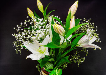 A bouquet of flowers made of white lilies