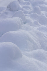 Winter drifts, photography of snow and drifts, footprints in the snow