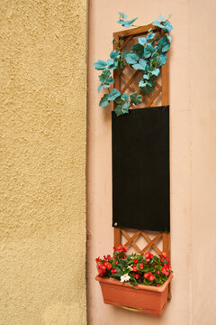 Empty chalk board on flower box as a mock-up template