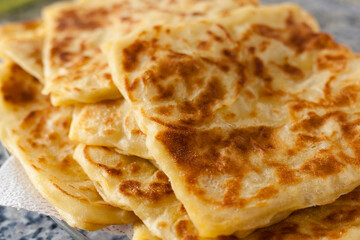 Rghayf or Msemmen are a squared crunchy pancakes traditional from Morocco and North Africa. 