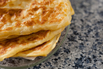 Rghayf or Msemmen are a squared crunchy pancakes traditional from Morocco and North Africa. 