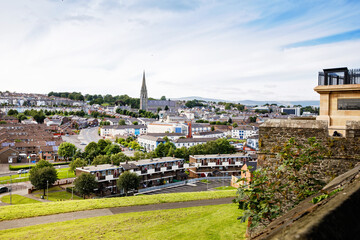 Derry, North Ireland. Aerial view of Derry Londonderry city center in Northern Ireland, UK. Sunny...