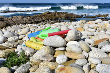 Beach with plastic pollution at famous Rias Baixas Region. Galicia, Spain.